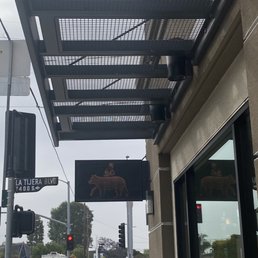 Exterior outside entrance of The Boy & The Bear - Find this logo on the corner! #ShiftLocal - Westchester, California Exterior outside entrance of The Boy & The Bear - Find this logo on the corner! #ShiftLocal - Westchester, California