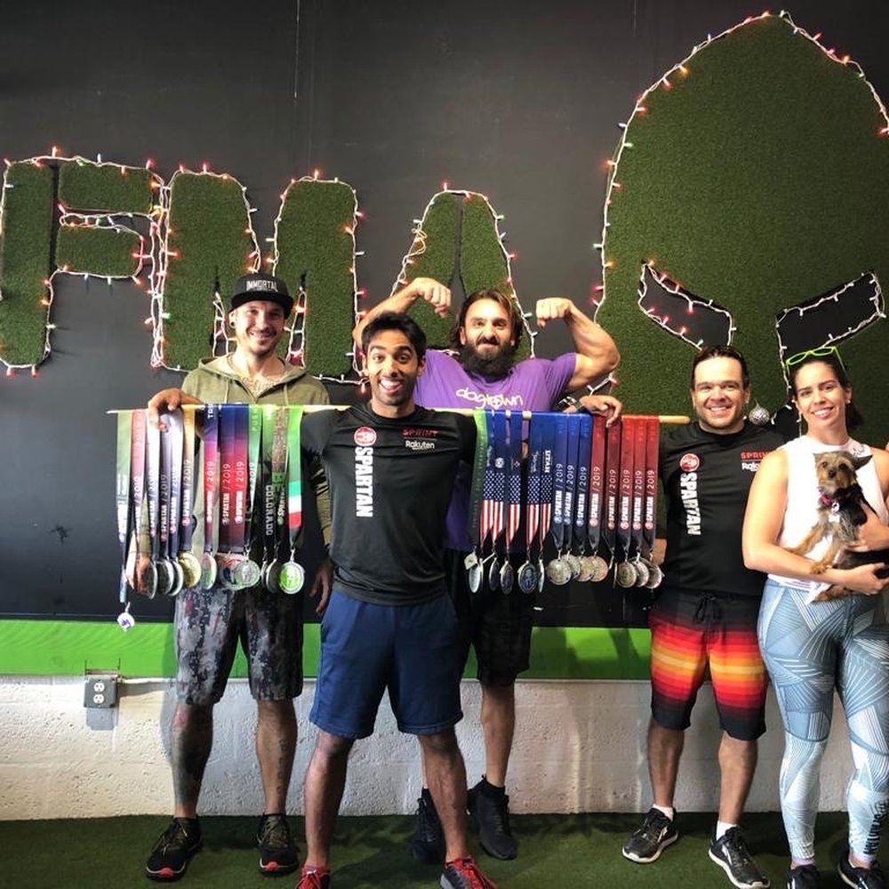 Focused Movement Academy - Main mural at entrance with FMA Athlete race medals - Boot Camps Near Me - Miami, Florida Focused Movement Academy - Main mural at entrance with FMA Athlete race medals - Boot Camps Near Me - Miami, Florida