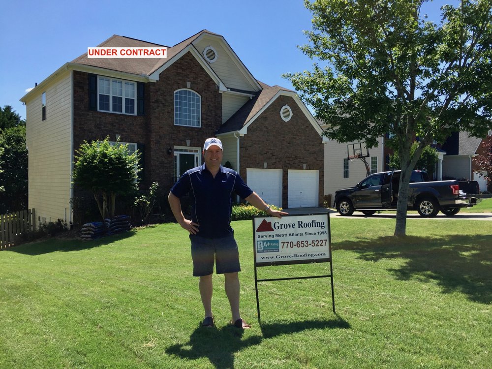 Slide of Grove Roofing