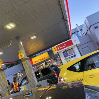 Shell - a gas station with a yellow car parked in front of it - Gas Stations Near Me - Surrey, British Columbia Shell - a gas station with a yellow car parked in front of it - Gas Stations Near Me - Surrey, British Columbia
