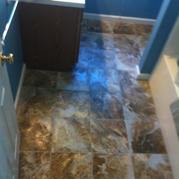 Award Flooring - a bathroom with blue walls - Carpeting Near Me - Buzzards Bay, Massachusetts Award Flooring - a bathroom with blue walls - Carpeting Near Me - Buzzards Bay, Massachusetts