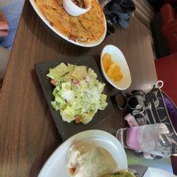 Buffalo chicken wrap and birria quesadilla