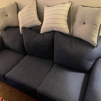 Dusting Duet Cleaning Service - three pillows on a couch - Home Cleaning Near Me