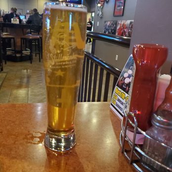 The Bar - Wausau - a glass of beer on a table - New American Near Me - Rothschild, Wisconsin