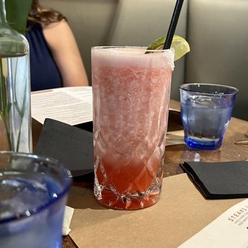 J. Baldwin's - a pink drink with a lime garnish - New American Near Me - Clinton Township, Michigan J. Baldwin's - a pink drink with a lime garnish - New American Near Me - Clinton Township, Michigan