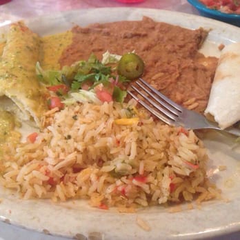 Chuy's - Chicka chicka boom boom enchilada and a pork taco + green chile rice. - Tex-Mex Near Me - Kennesaw, Georgia Chuy's - Chicka chicka boom boom enchilada and a pork taco + green chile rice. - Tex-Mex Near Me - Kennesaw, Georgia
