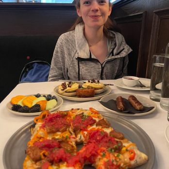 Crossroads Kitchen - Eggs Benedict, fruit, breakfast sausage, Supreme deep dish pizza !! So happy! Breakfast sausage was a little dry but the flavor was 10/10 - Vegan Near Me - Los Angeles, California