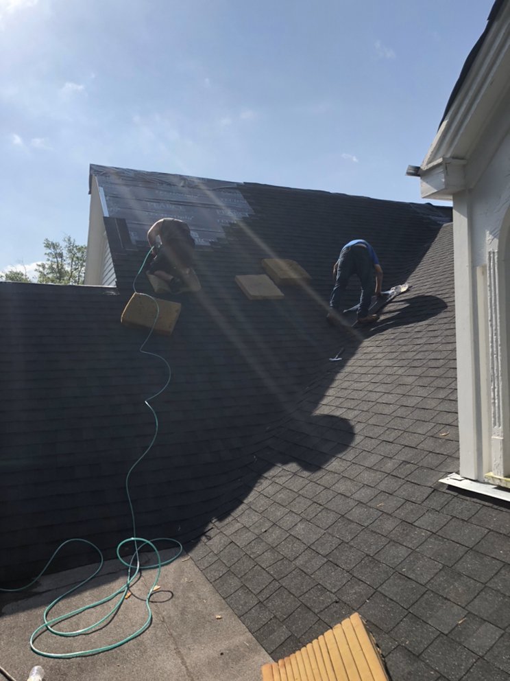 Slide of Yank's Roofing