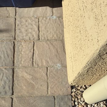 Desert Shield Pest Control - Barely visible holes through grout lines in pavers to place treatment. - Pest Control Near Me