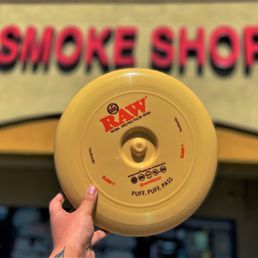 Exterior outside entrance of Happy Valley Smoke Shop - Raw Puff Puff Pass Flying Disc - Phoenix, Arizona Exterior outside entrance of Happy Valley Smoke Shop - Raw Puff Puff Pass Flying Disc - Phoenix, Arizona
