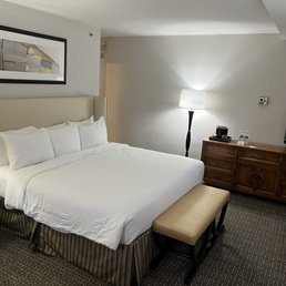Hotel room with king-sized bed Hotel room with king-sized bed
