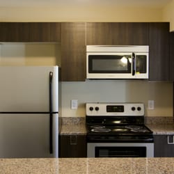Ashford Pavilion Apartments - Granite counter tops, stainless steel appliances, italian cabinets. Well done.