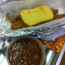 ShaPau's Family Restaurant - Fried fish on potato bread toast and red beans and rice