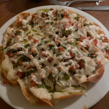 Reyna's Restaurant - Vegan nachos - Mexican Near Me - Lemoore, California Reyna's Restaurant - Vegan nachos - Mexican Near Me - Lemoore, California