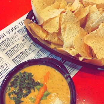 Torchy's Tacos - Green chili queso and chips - Tex-Mex Near Me - Memphis, Tennessee Torchy's Tacos - Green chili queso and chips - Tex-Mex Near Me - Memphis, Tennessee