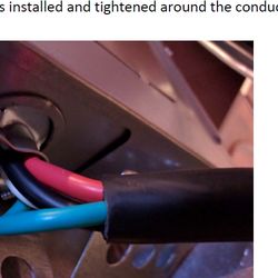 Cable clamp around conductors