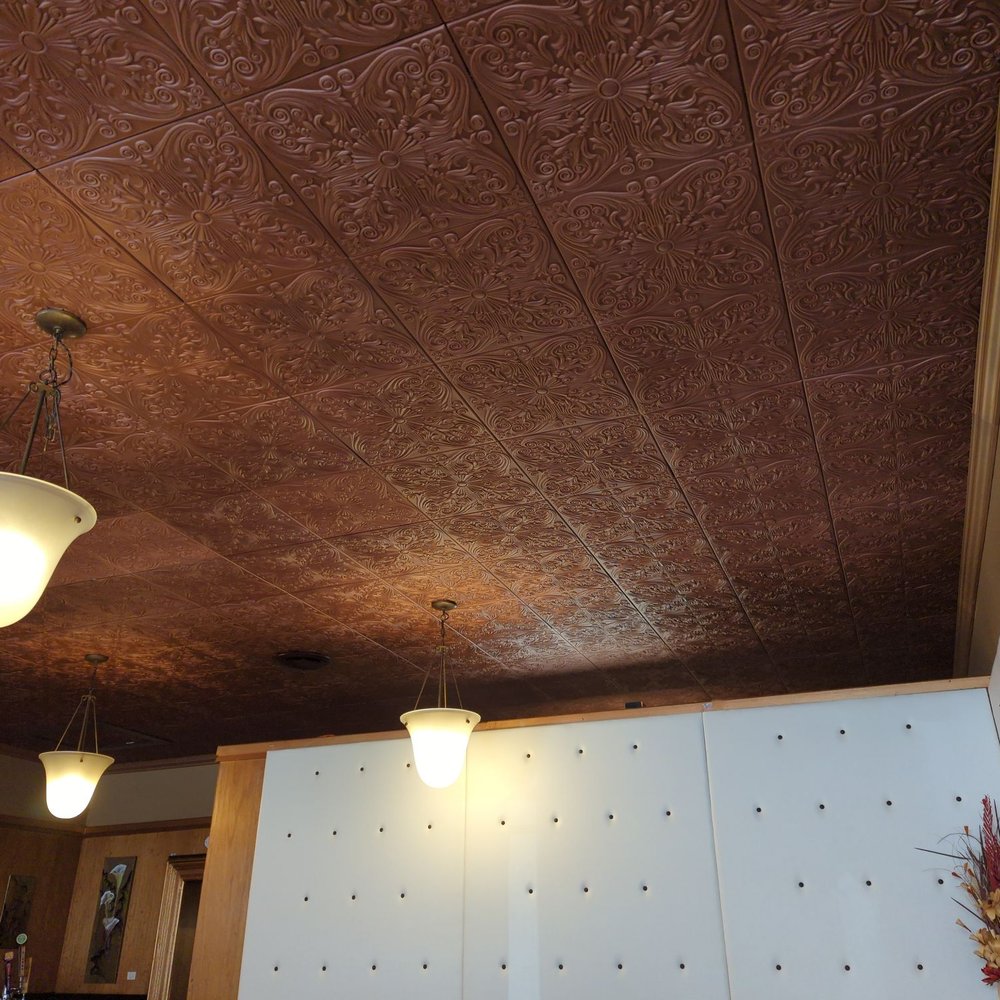 The Greene Lily - Wall and ceiling decor, with pressed tin ceiling. Picture cropped to leave out other diners - Breakfast & Brunch Near Me - Eureka, California