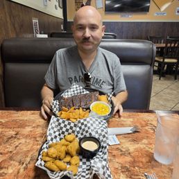 St. Louis Ribs, mac and cheese, and wedge fries. Fried pickles for appetizer. St. Louis Ribs, mac and cheese, and wedge fries. Fried pickles for appetizer.