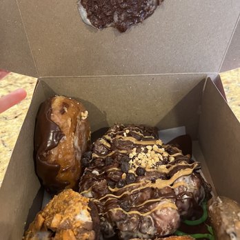 Voodoo Doughnut - Donuts just thrown in an inappropriate donut box haphazardly - Donuts Near Me - Chicago, Illinois