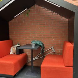 Unique booth. All of the seating is interesting and looks comfortable.