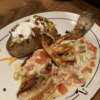 Saltgrass Steak House - HRW Blackened redfish with loaded baked potato was - Steakhouses Near Me - Houston, Texas