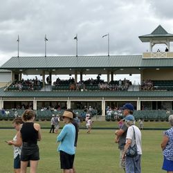 The Villages Polo Club - View of the Grandstand from the field - everyone is waiting in line for Champagne.