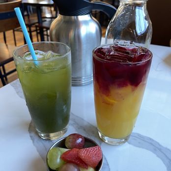 First Watch - "Kale Tonic" and "Morning Meditation" from the Juice Bar; fruit cup in foreground. - Breakfast & Brunch Near Me - Kennesaw, Georgia First Watch - "Kale Tonic" and "Morning Meditation" from the Juice Bar; fruit cup in foreground. - Breakfast & Brunch Near Me - Kennesaw, Georgia