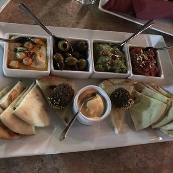 Baboush - Shared platter: red sauce is the best but beware: you'll need to spend more for extra Pita - Moroccan Near Me - Dallas, Texas