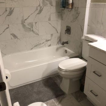 Queen Monarch Design - a bathroom with a toilet and bathtub - Flooring Near Me - Imperial, Missouri Queen Monarch Design - a bathroom with a toilet and bathtub - Flooring Near Me - Imperial, Missouri
