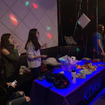 KTVing Karaoke - a group of people standing around a table - Karaoke Near Me - Centereach, New York KTVing Karaoke - a group of people standing around a table - Karaoke Near Me - Centereach, New York