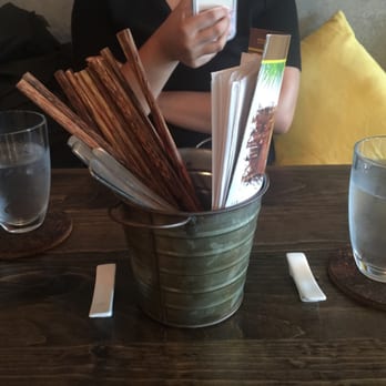 Ginger and Lemongrass - How they hold the utensils and menu! - Vietnamese Near Me - Whitestone, New York Ginger and Lemongrass - How they hold the utensils and menu! - Vietnamese Near Me - Whitestone, New York