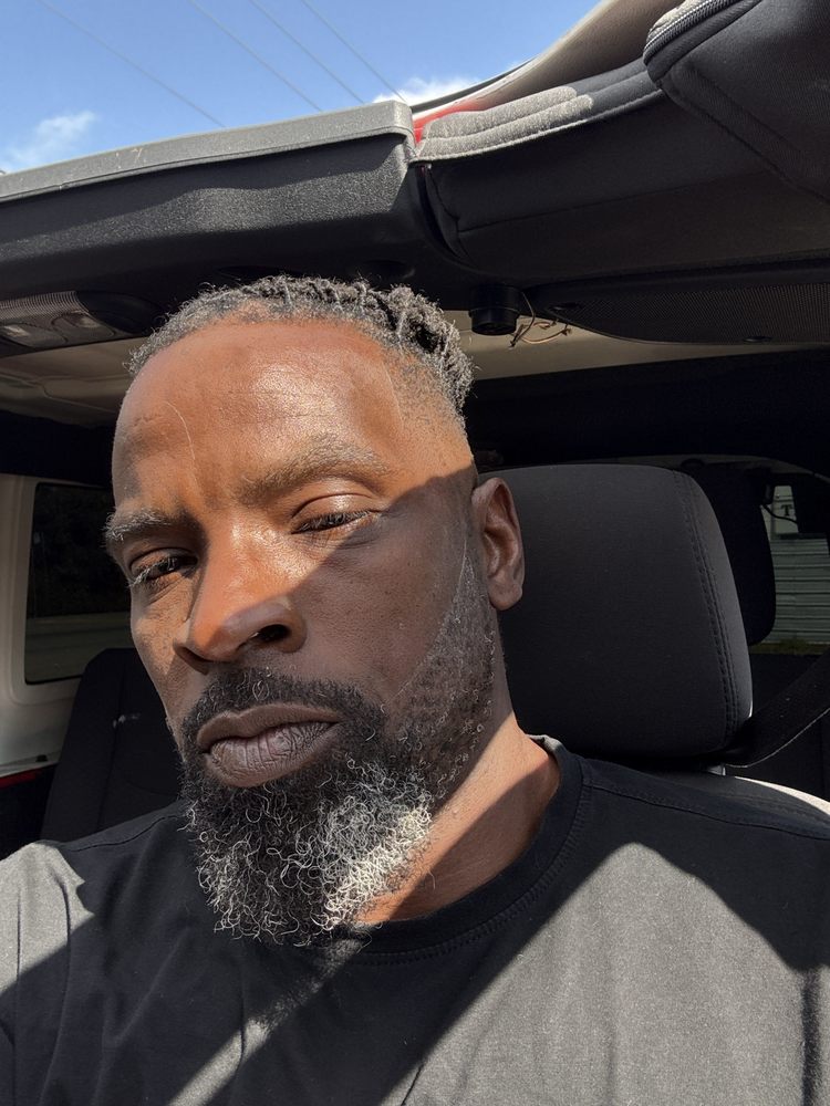 Buster The Barber Logo