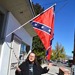 Barter-Inn - Penny Fortner, owner of the Barter Inn sells old military goods and Confederate Flags in Old Town Cottonwood, Arizona.