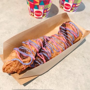 Cosmic Ray's Starlight Café - a doughnut with blue and pink icing - Sandwiches Near Me - Orlando, Florida
