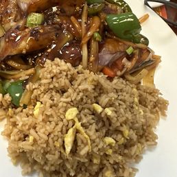 Eggplant with garlic and fried rice, curry chicken with friend rice, empty plates says it all Eggplant with garlic and fried rice, curry chicken with friend rice, empty plates says it all