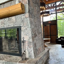 On The Green Bistro - Real wood burning fireplace in entrance