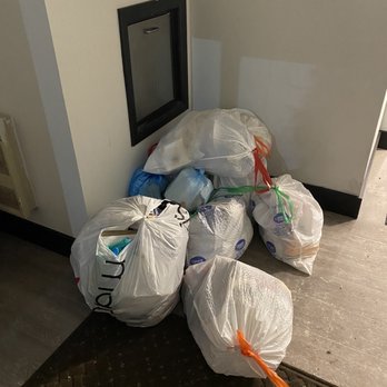 The Evalee Apartments - Trash piled up on the main floor. - Apartments Near Me - Pittsburgh, Pennsylvania