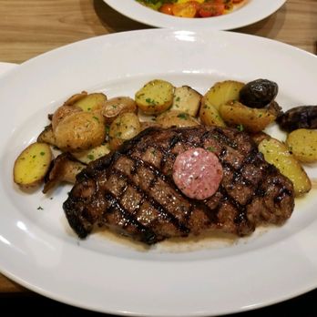 Sprigs Grille Restaurant - Char-grilled grass fed new york strip steak with fingerling potatoes and mushrooms - Seafood Near Me - Kapolei, Hawaii