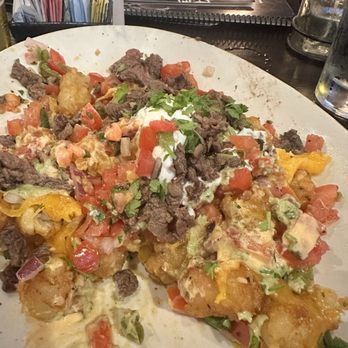Local Kitchen - Tater tots nacho steak (big portion, easily shareable for 3-4) - Cocktail Bars Near Me - Torrance, California Local Kitchen - Tater tots nacho steak (big portion, easily shareable for 3-4) - Cocktail Bars Near Me - Torrance, California