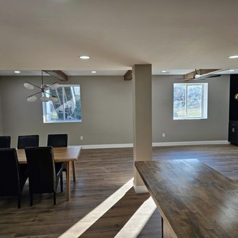 Promax Contracting - a dining room and living room - General Contractors Near Me - Chesterfield, Missouri