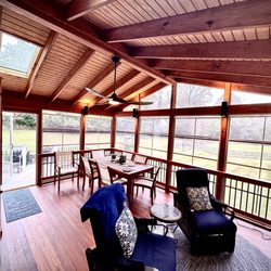 Northern Deck Works - Interior three season room, Wood double out swing front door and Velux skylights