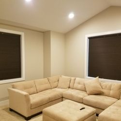 Bloomin' Blinds of Bellevue - Blackout motorized honeycomb shades for a media room controlable via voice with Amazon Alexa.