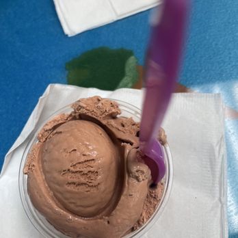 Mad Mike's Ice Cream - fudge brownie cup with a purple spoon - Ice Cream & Frozen Yogurt Near Me - Pantego, Texas Mad Mike's Ice Cream - fudge brownie cup with a purple spoon - Ice Cream & Frozen Yogurt Near Me - Pantego, Texas