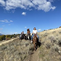 Trail riding with a view of the Tetons