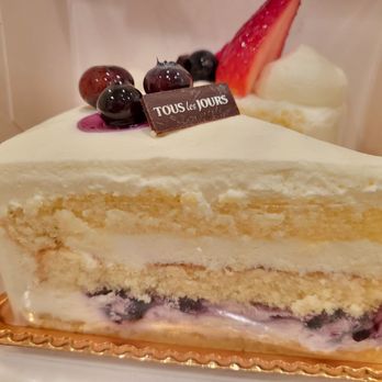 Tous Les Jours - Blueberry Cloud Piece ($5.95). I loved this one, but not enough blueberries and pricey for a small slice. 3/1/2023 - Bakeries Near Me - Irvine, California Tous Les Jours - Blueberry Cloud Piece ($5.95). I loved this one, but not enough blueberries and pricey for a small slice. 3/1/2023 - Bakeries Near Me - Irvine, California