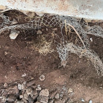 Precise Masonry Contractors - Not sure how this chain link fence helps my rock wall. - General Contractors Near Me - Pearl City, Hawaii Precise Masonry Contractors - Not sure how this chain link fence helps my rock wall. - General Contractors Near Me - Pearl City, Hawaii