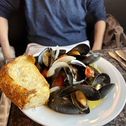 Laura - Wonderful mussels with delicious bread to soak the juice.