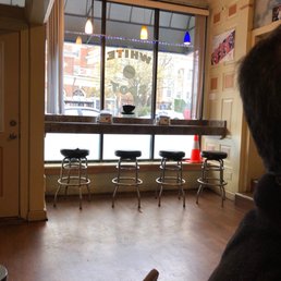 a man sitting at a bar