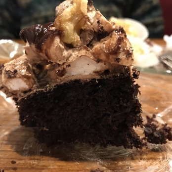 Popi's - This was like a rocky road chocolate cake with chocolate drizzled over it. - Pizza Near Me - Benton, Kentucky