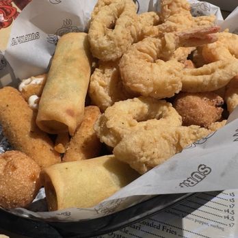 Surfing Crab - Eggroll, mozzarella sticks, shrimp, and hush puppy appetizer - Cajun/Creole Near Me - Round Rock, Texas Surfing Crab - Eggroll, mozzarella sticks, shrimp, and hush puppy appetizer - Cajun/Creole Near Me - Round Rock, Texas